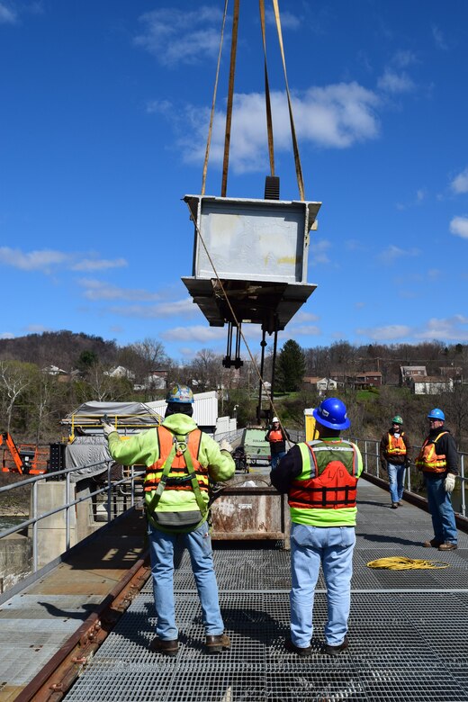 Members of the repair party work on Montgomery Locks and Dam on the Ohio River. 