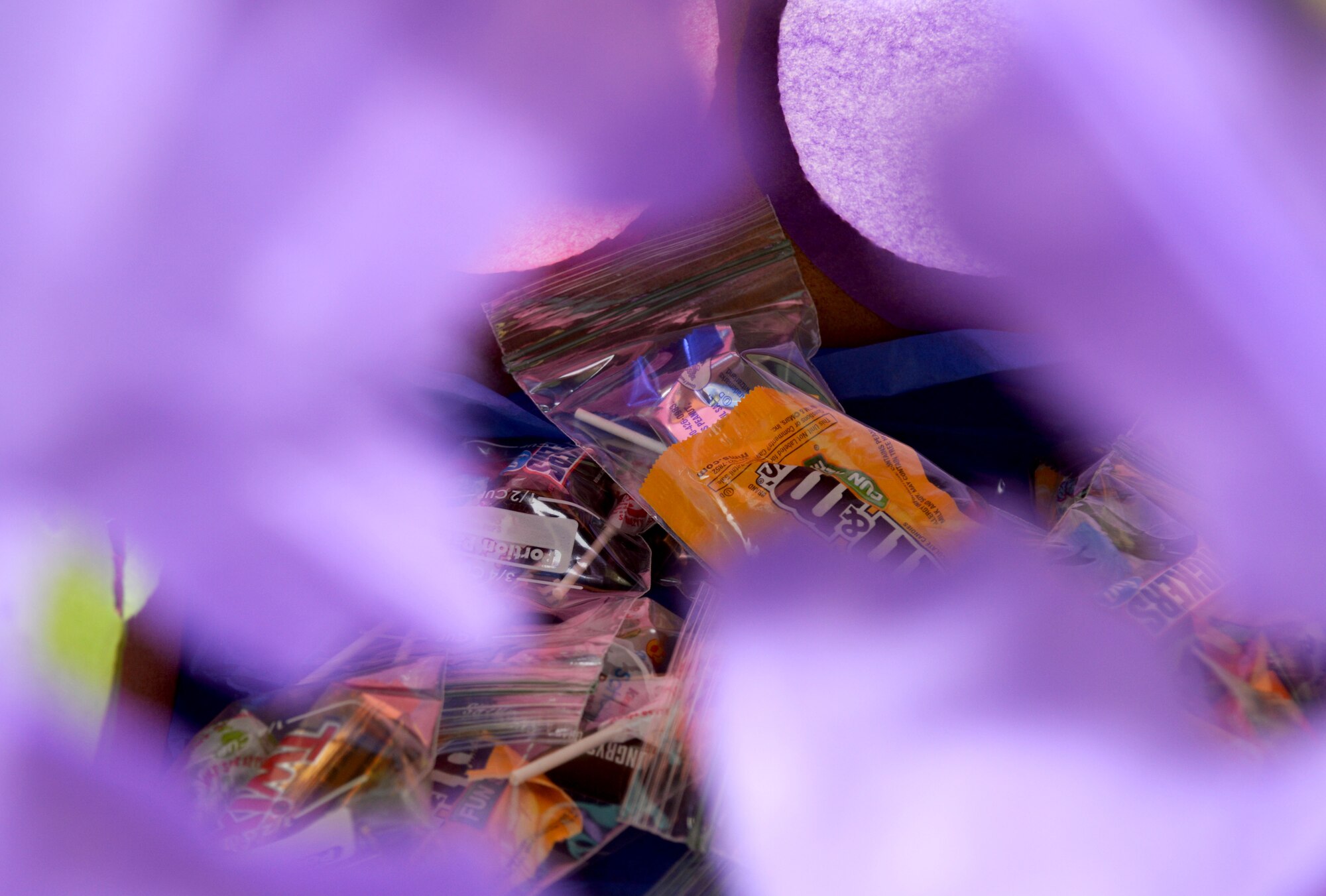 The “Candy Box Punch” craft offers candy at the “Hearts Apart” event at the base chapel June 9, 2016, on RAF Mildenhall, England. “Hearts Apart” is a free dinner and a night out for families of deployed service members. (U.S. Air Force photo by Airman 1st Class Tenley Long/Released)  