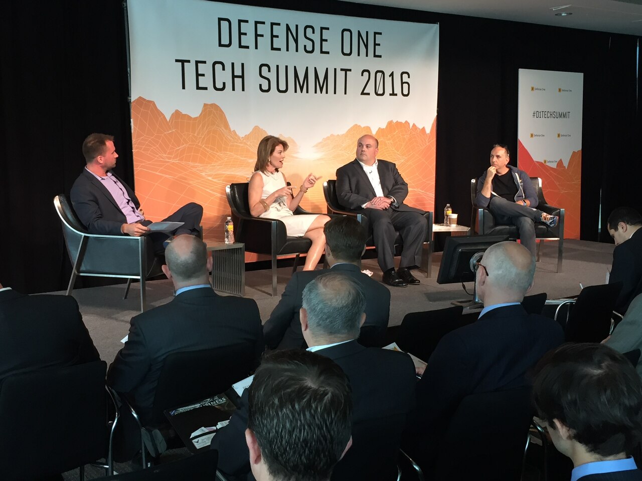 Defense Digital Service Director Chris Lynch, right, explains how his office works within the Pentagon during a presentation at the Defense One Tech Summit in Washington, June 10, 2016. DoD photo by Jim Garamone