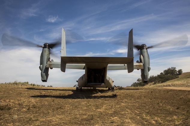 An MV-22B Osprey with Marine Medium Tiltrotor Squadron (VMM) 165, prepares for takeoff during controlled area landing (CAL) training at Marine Corps Base Camp Pendleton, Calif., June 8. The training consisted of landing and taking off in less familiar areas to increase awareness of different types of landing zones. (U.S. Marine Corps photo by Sgt. Michael Thorn/Released)