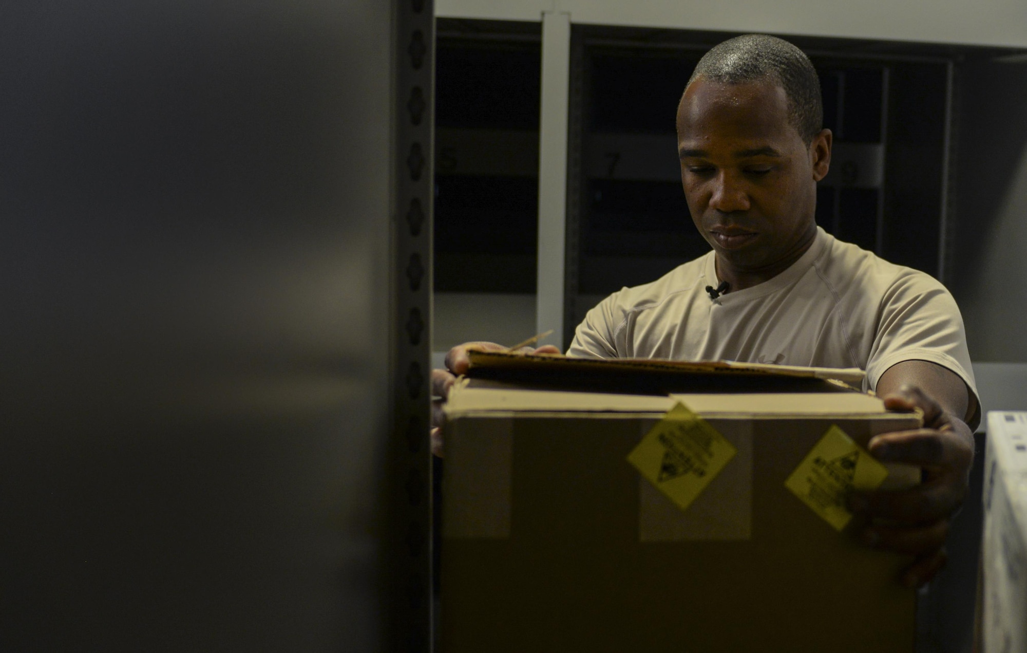 Staff Sgt. Wendell Belford, 99th Logistics Readiness Squadron F-35 aircraft parts store supervisor, checks the serial number on a box before moving it to the F-35 aircraft service center’s new location at Nellis Air Force Base, Nev., June 6, 2016. The 99th LRS F-35 aircraft parts store is a shred that has only one singular mission: to support the F-35 program. (U.S. Air Force photo by Airman 1st Class Kevin Tanenbaum)