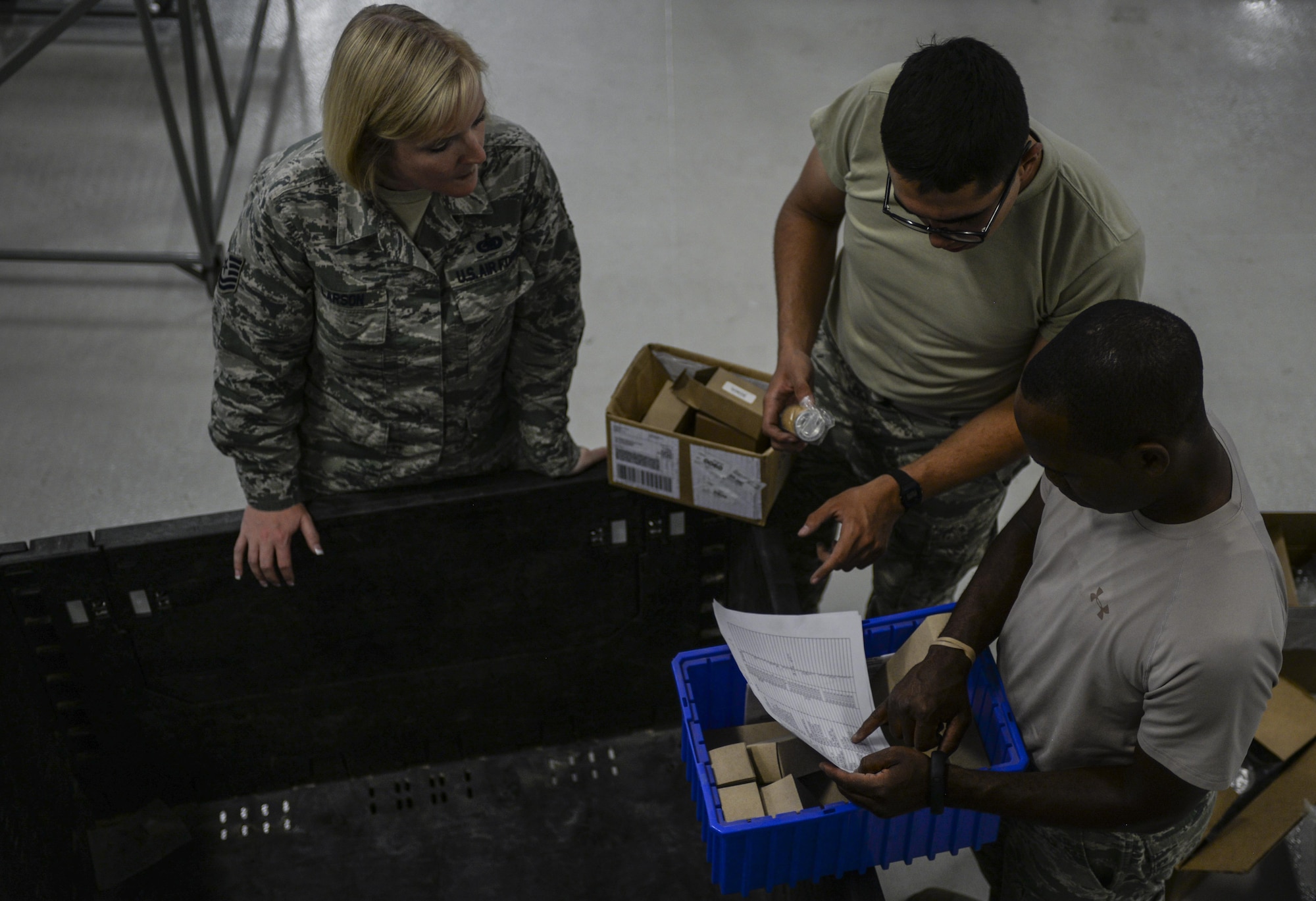 Tech. Sgt. Tiffany Larson, 99th Logistics Readiness Squadron NCO in-charge of the F-35 Aircraft Parts Store, works with her Airmen to move F-35 parts from the store’s old location into their new building at Nellis Air Force Base, Nev., June 6. The Airmen of the parts store will be moving to a new location and assisting with the school house curriculum in order to help prepare the Air Force to bring the
F-35 to Initial Operational Capability. (U.S. Air Force photo by Airman 1st Class Kevin Tanenbaum)