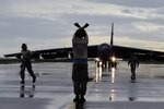 An Air Force crew chief parks a B-52 Stratofortress after it landed at Andersen Air Force Base, Guam, Aug. 12, 2015. Defense Logistics Agency Aviation is tasked with helping sustain the Air Force’s long-range bomber for another 30 plus years. 
