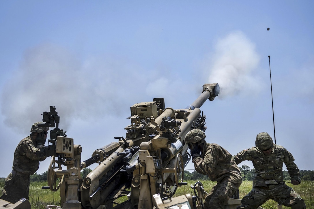 Soldiers fire an M777A2 howitzer during exercise Crescent Reach 16 at Fort Bragg, N.C., May 26, 2016. Air Force photo by Airman 1st Class Sean Carnes