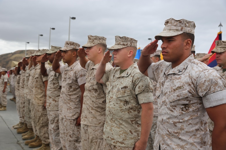 MARINE CORPS BASE CAMP PENDLETON, Calif. – Marines with 1st Combat Engineer Battalion, 1st Marine Division, salute during a rededication ceremony as part of the unit’s 75th anniversary at Camp Pendleton May 26, 2016.  The ceremony honored its current unit awards while also recognizing the veterans in attendance who served in some of the notorious battles of old, during World War II, the Vietnam War and the Gulf War. (U.S. Marine Corps photo by Cpl. Demetrius Morgan/RELEASED)