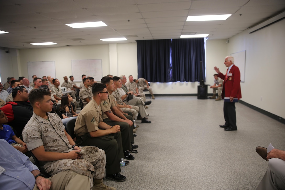 MARINE CORPS BASE CAMP PENDLETON, Calif. – A Marine veteran speaks to current service members about his time in the Marine Corps during the 1st Combat Engineer Battalion, 1st Marine Division, 75th anniversary celebration at Camp Pendleton May 27, 2016. On the second day, veterans were center stage as they presented themselves and their military experiences with the current personnel of 1st CEB. (U.S. Marine Corps photo by Cpl. Demetrius Morgan/RELEASED)