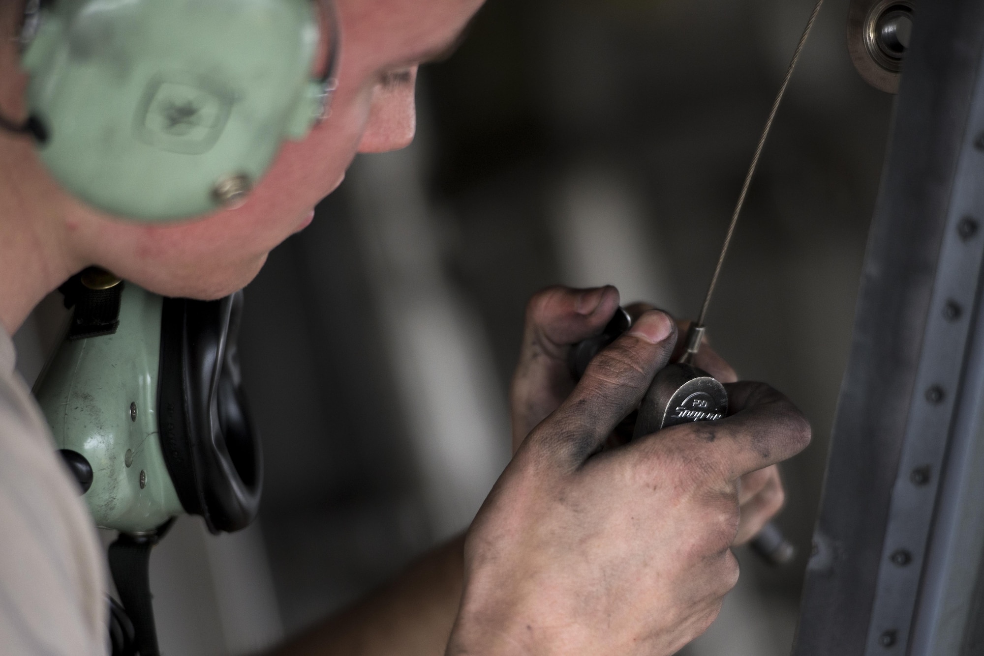 U.S. Air Force Airman 1st Class Collin Blackburn, an aerospace propulsion journeyman assigned to the 494th Aircraft Maintenance Unit out of Royal Air Force Lakenheath, England, secures an engine into place on an F-15E Strike Eagle dual-role fighter aircraft June 8, 2016, during RED FLAG-Alaska (RF-A) 16-2 at Eielson Air Force Base, Alaska. RF-A is a Pacific Air Forces commander-directed field training exercise for U.S. and allied forces, providing joint offensive counter-air, interdiction, close air support, and large force employment training in a simulated combat environment. (U.S. Air Force photo by Capt. Elias Zani/Released)