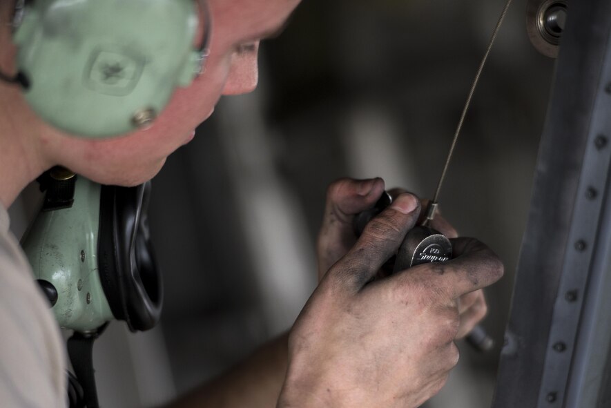 U.S. Air Force Airman 1st Class Collin Blackburn, an aerospace propulsion journeyman assigned to the 494th Aircraft Maintenance Unit out of Royal Air Force Lakenheath, England, secures an engine into place on an F-15E Strike Eagle dual-role fighter aircraft June 8, 2016, during RED FLAG-Alaska (RF-A) 16-2 at Eielson Air Force Base, Alaska. RF-A is a Pacific Air Forces commander-directed field training exercise for U.S. and allied forces, providing joint offensive counter-air, interdiction, close air support, and large force employment training in a simulated combat environment. (U.S. Air Force photo by Capt. Elias Zani/Released)
