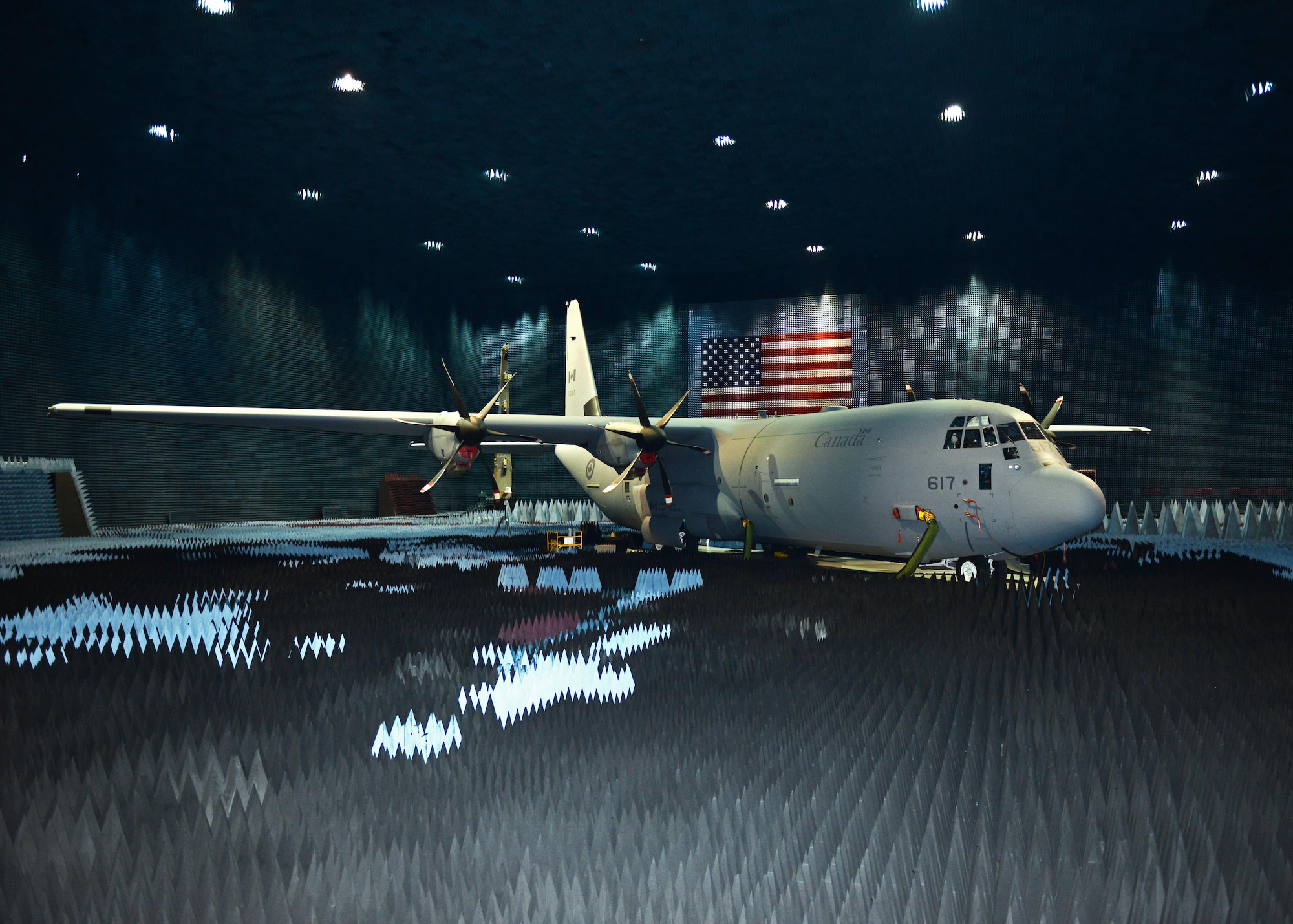 A Royal Canadian Air Force CC-130J tactical airlift aircraft sits in the Benefield Anechoic Facility on Edwards Air Force Base, Calif., undergoing electronic warfare testing. Canada purchased 17 CC-130Js with the last one delivered in 2012. The RCAF CC-130J fleet is currently going through a block 7 upgrade to the aircraft avionics (U.S. Air Force photo/Kenji Thuloweit) 