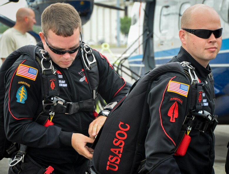 An Army Black Dagger parachute team prepares prior to a jump May 17 at Duke Field, Fla.  They jumped out of a C-145 Skytruck, stationed exclusively at Duke Field.  The team is composed of volunteers from throughout the Army special operations community. Their mission is to perform live aerial demonstrations in support of Army special operations community relations and recruiting.  (U.S. Air Force photo/Dan Neely) 