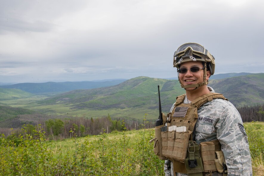 U.S. Air Force Staff Sgt. Eugene Tabita, a 14th Fighter Squadron independent duty medical technician, takes a break after observing close air support coordinated by Staff Sgt. Jacob Rinker, a 13th Air Special Operations Squadron joint terminal attack controller, Fort Carson, Colo., June 8, 2016, in the Joint Pacific Alaska Range Complex during RED FLAG-Alaska 16-2. The exercise provides unique opportunities to integrate various forces into joint, coalition and multilateral training from simulated forward operating bases. (U.S. Air Force photo by Staff Sgt. Shawn Nickel/Released)