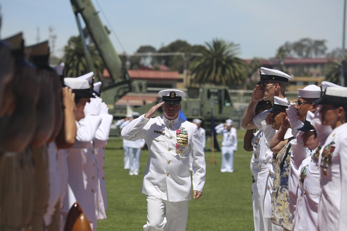 MARINE CORPS BASE CAMP PENDLETON, Calif. – Master Chief Petty Officer Michael Smith, outgoing command master chief of I Marine Expeditionary force, ‘goes ashore’ for the last time at the conclusion of his change of charge and retirement ceremony on Camp Pendleton June 3, 2016. Stemming from the naval tradition of requesting permission to leave the ship, ‘going ashore’ signifies the honorable retirement of a sailor from naval service. Master Chief Petty Officer Frank Dominguez, a Superior, Arizona native, is replacing Smith, a Ridgecrest native, as the command master chief of I Marine Expeditionary Force. (U.S. Marine Corps Photo By Cpl. Garrett White/Released)