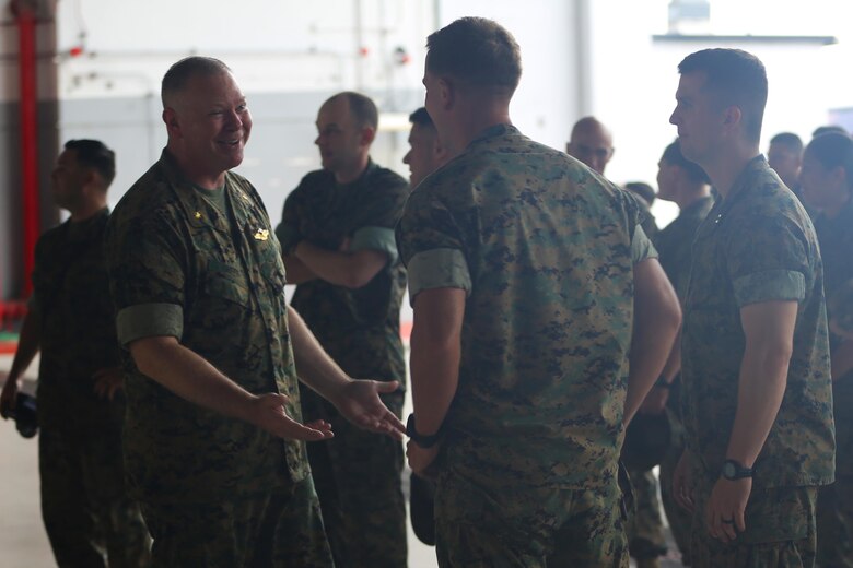 Lt. Cmdr. Paul Greer speaks to Marines at a change of command ceremony aboard Marine Corps Air Station Cherry Point, N.C., June 6, 2016. Greer was recogized for the 2016 Military Chaplains Association Distinguished Service Award, and will recieve the award in Oct. 2016. The award recognizes one representative from each branch of service for their performance and dedication to the troops while serving as a chaplain. Greer is the chaplain for Marine Aircraft Control Group 28, and is the second 2nd MAW chaplain to win the award for the Marine Corps in the past two years. (U.S. Marine Corps photo by Lance Cpl. Mackenzie Gibson/Released)