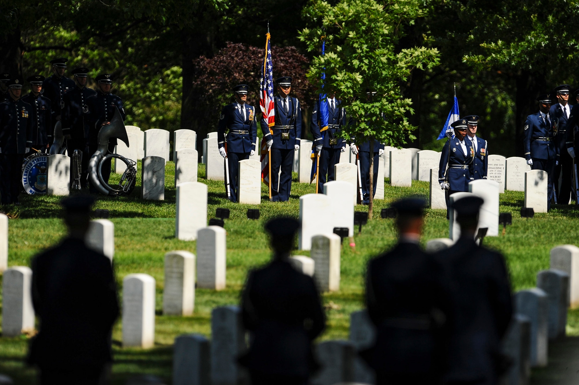 Members of the U.S. Air Force Honor Guard provide full honors for former 2nd Lt. Malvin G. Whitfield, an Army Air Forces and Air Force veteran, at Arlington National Cemetery, Va., June 8, 2016. (U.S. Air Force photo/Tech. Sgt. Bryan Franks)