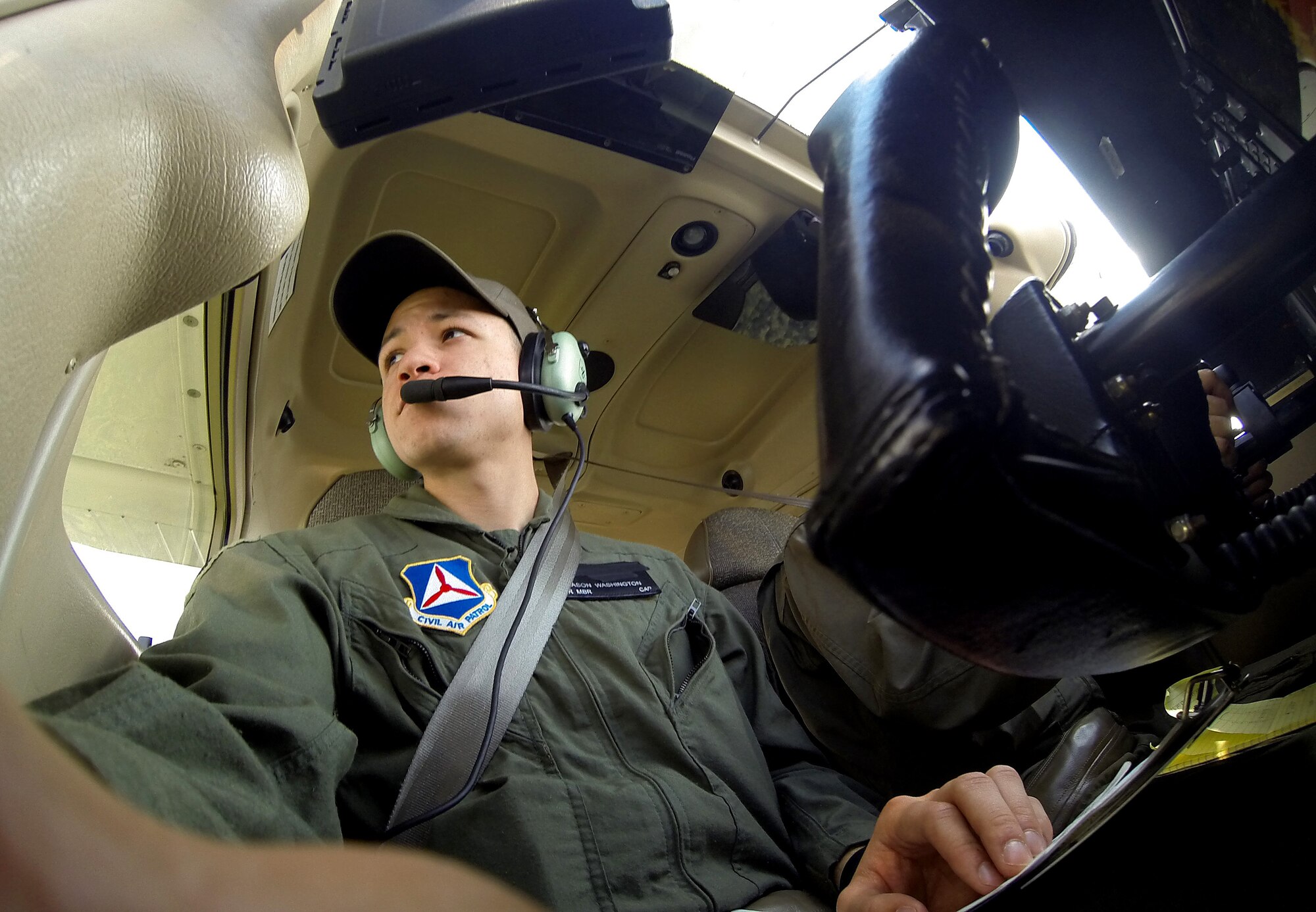 Senior Airman Jason Washington, 62nd Aircraft Maintenance Squadron aerospace maintenance journeyman, fly's a cesena plane June 4, 2016 at Pierce County Airport, Wash. (courtesy photo)