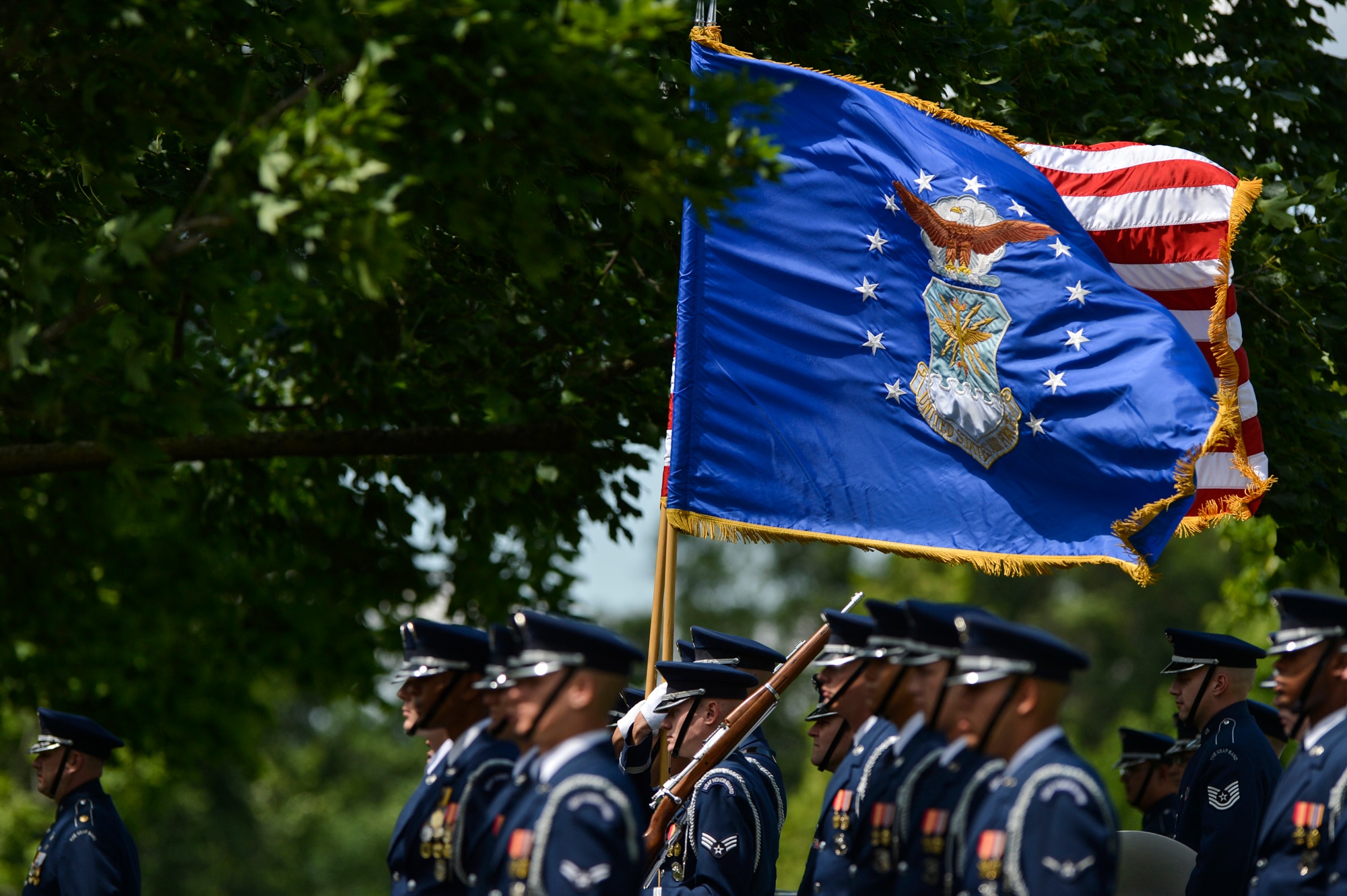 Members of the U. S. Air Force Honor Guard stand at attention during the graveside ceremony for 2nd Lt. Malvin G. Whitfield, Army Air Forces and Air Force veteran, at Arlington National Cemetery, June 8, 2016. Whitfield joined the Army Air Forces in 1943 as a Tuskegee Airman, one of the more than 1,000 African-American pilots who fought in World War II. He died Nov. 19, 2015, at the age of 91. (U.S. Air Force Photo by Tech. Sgt. Joshua L. DeMotts/Released)