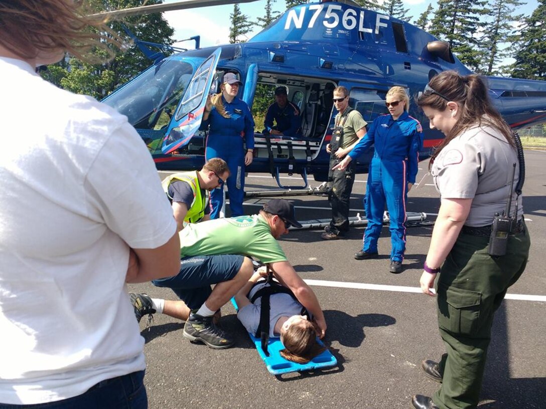 Members of the Bonneville Emergency Rescue Team got tips from a Life Flight Network crew about how to quickly and efficiently prepare an injured person for transport to a hospital.  Bonneville is located about 60 miles from Portland, so Life Flight is often the best mode of travel for seriously injured people who need to be transported to a metropolitan hospital.  