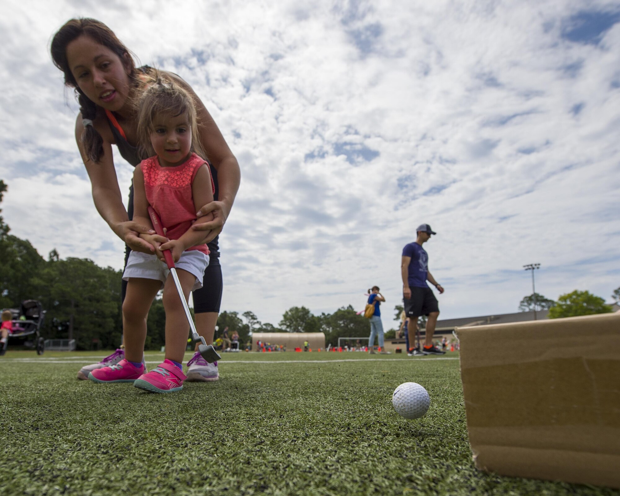 Hurlburt families participate in the base library’s Summer Reading Program kickoff at Hurlburt Field, Fla., June 9, 2016. The program opened with a summer Olympics-themed event where Hurlburt youth participated in 10 activity stations. The stations combine mental and physical challenges to teach children about the importance of mental and physical training. (U.S. Air Force photo by Airman 1st Class Kai White)