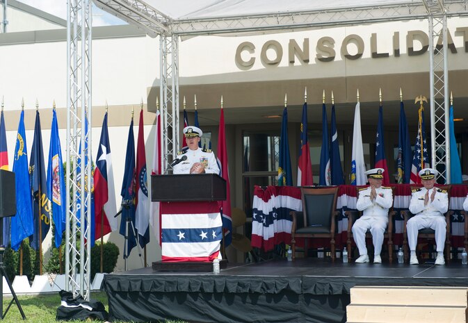 Commander Brett Pugsley gives a speech after becoming the Naval Consolidated Brig Charleston commander at a change of command ceremony June 10, 2016, at Joint Base Charleston, S.C. Commander J. Michael Cole relinquished command to Pugsley after three years of service at the Brig. The Brig aims to return as many people to honorable service as possible or return them to civilian life as productive citizens.  (U.S Air Force photo/Airman 1st Class Kevin West)