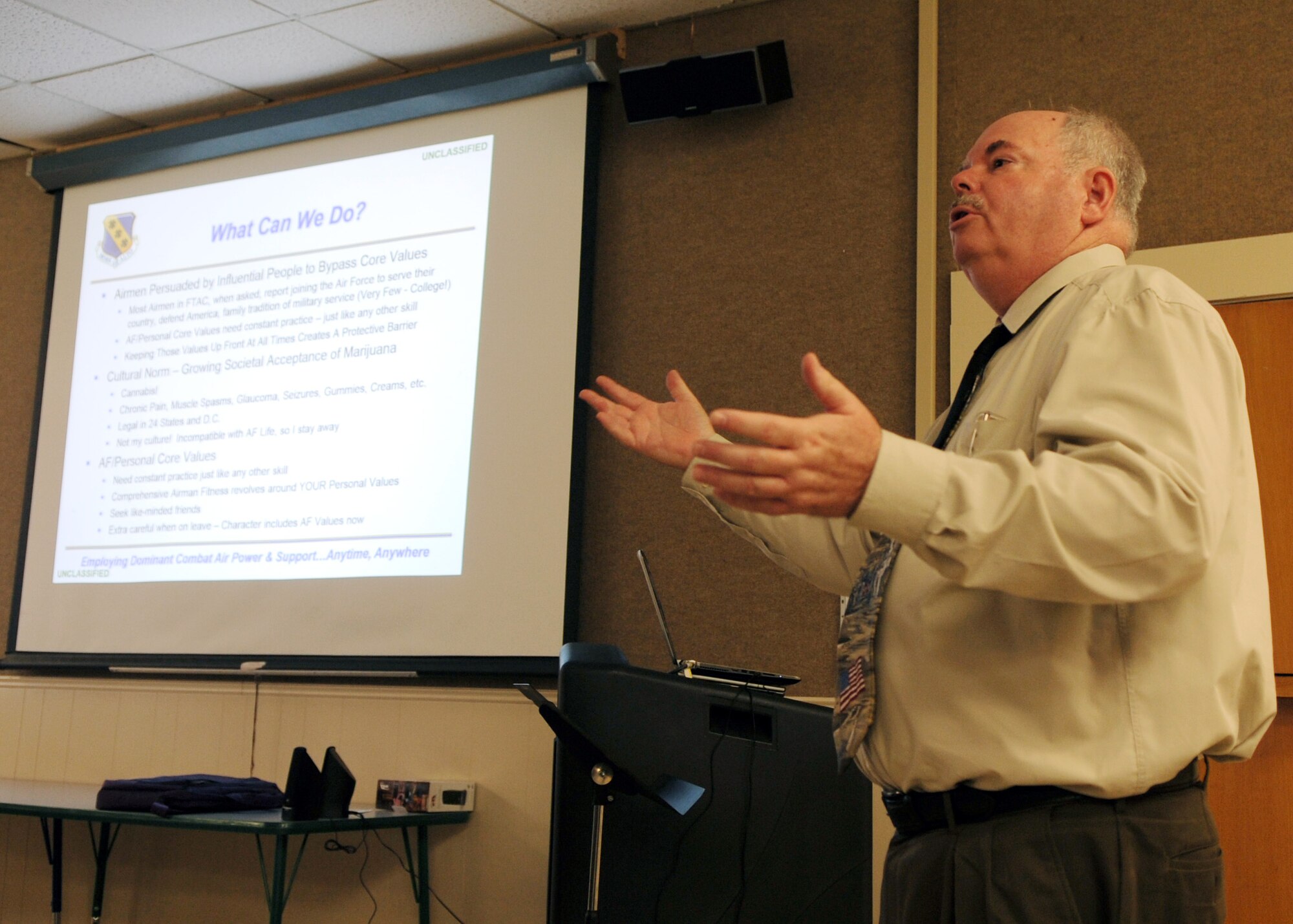 Bob Sayer, 7th Bomb Wing community support coordinator, speaks to Airmen during the first ever Fly-Flight-Win activity brief May 25, 2016, at Dyess Air Force Base, Texas. The Comprehensive Airman Fitness program educates Airmen on their role to the advancement of the Air Force, Air Force Global Strike Command and Dyess mission. The program also provides tools needed to stay resilient when faced with hardship. (U.S. Air Force photo by Senior Airman Kedesha Pennant/Released)