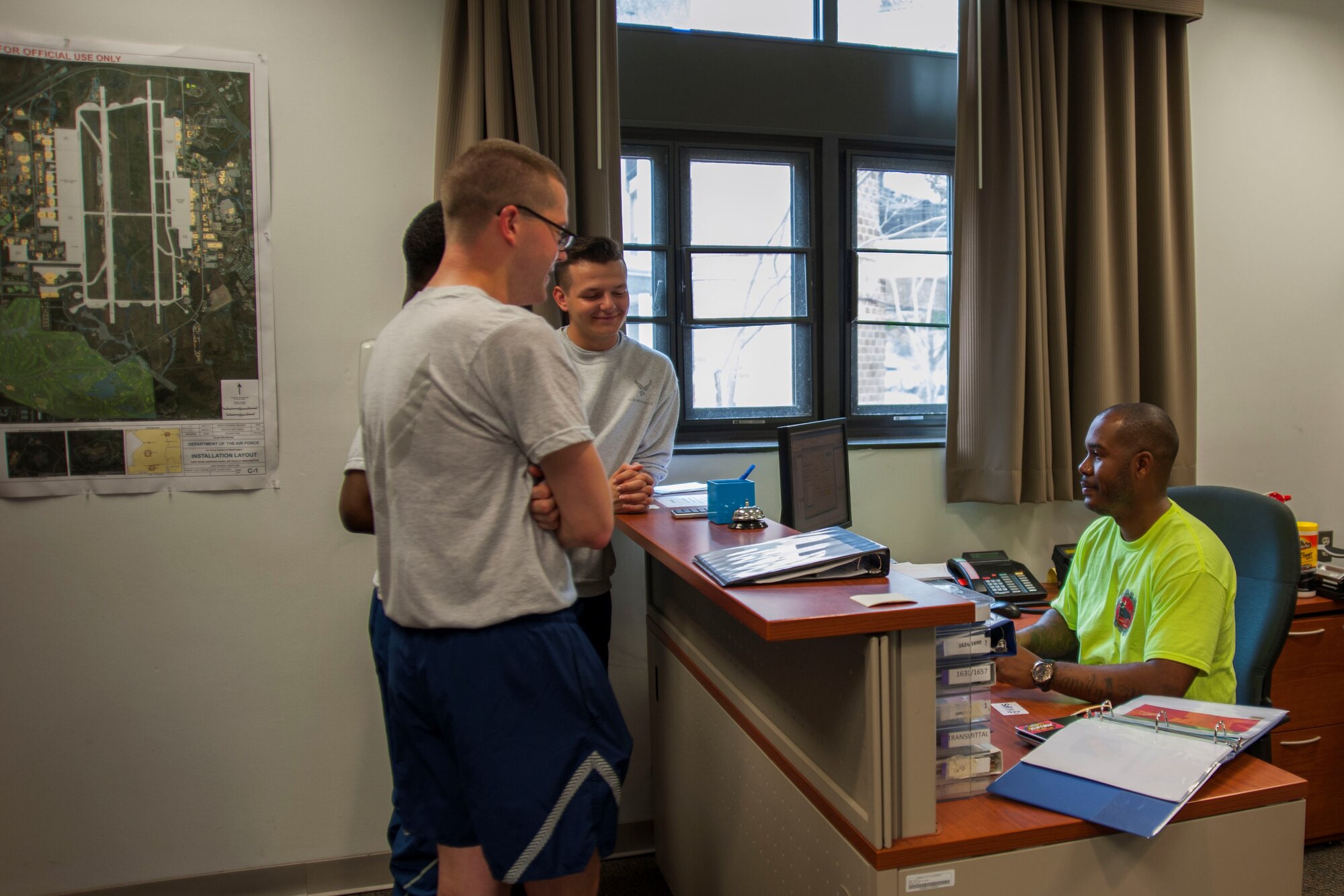 Tech. Sgt. Julius King, 11th Civil Engineer Squadron unaccompanied housing NCO in charge, directs Airmen assigned to the bay orderly program at Joint Base Andrews, Md., June 3,2016. Dorm residents are assigned as bay orderly detail to maintain the dorm grounds and common areas, as well as completing additional projects determined by dorm management. (U.S. Air Force photo by Airman 1st Class Rustie Kramer/Released)