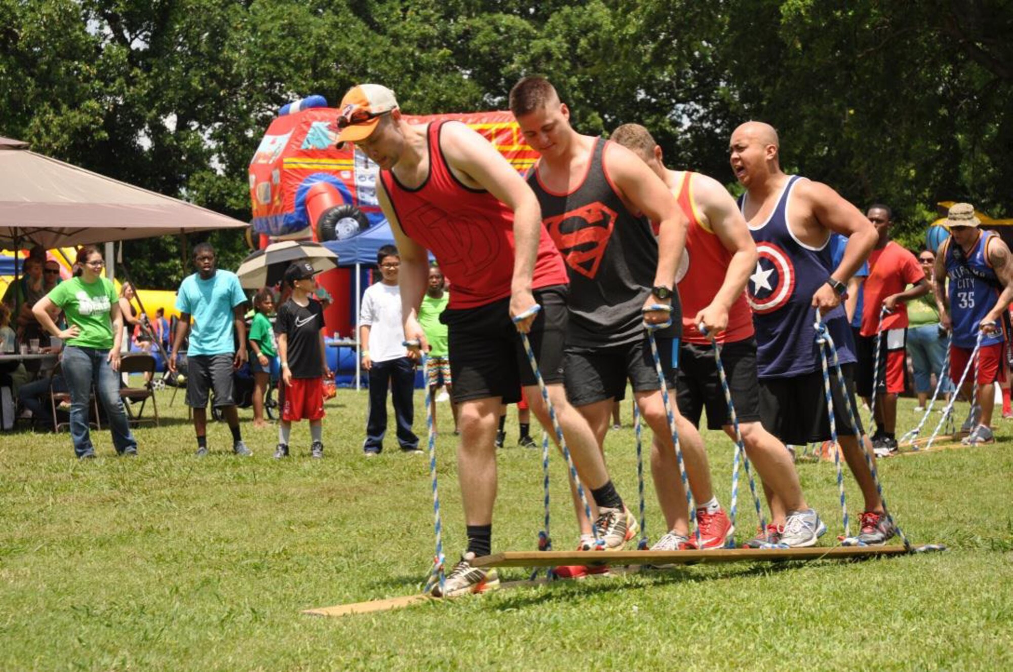 The Superfriends walk the plank all the way to the Wacky Olympics Championship. During Summer Bash June 4, competitors participated in the Olympics, which featured events such as a pie eating contest, Inflato boxing and bubble soccer. (Courtesy photo/Released)