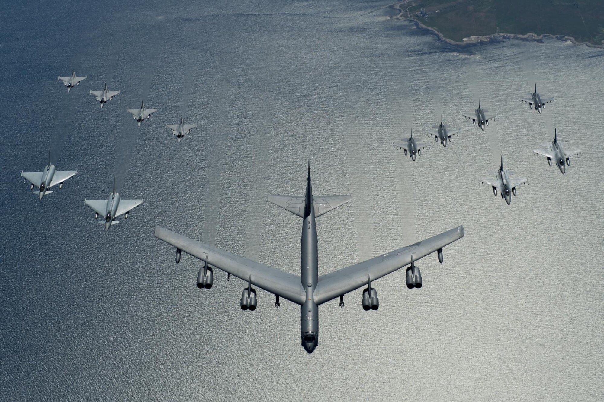A U.S. Air Force B-52 Stratofortress leads a formation of aircraft including two Polish air force F-16 Fighting Falcons, four U.S. Air Force F-16 Fighting Falcons, two German Eurofighter Typhoons and four Swedish Gripens over the Baltic Sea, June 9, 2016. The formation was captured from a KC-135 from the 434th Air Refueling Wing, Grissom Air Force Base, Indiana as part of exercise BALTOPS 2016. (U.S. Air Force photo/Senior Airman Erin Babis) 