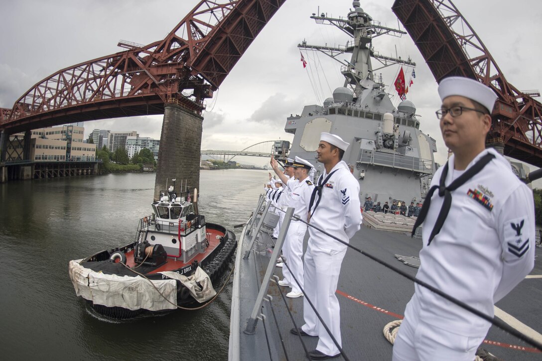 Sailors man the rails as the USS Howard arrives for the Portland Rose Festival in Portland, Ore., June 9, 2016. Navy photo by Petty Officer 2nd Class Alex Van’tLeven