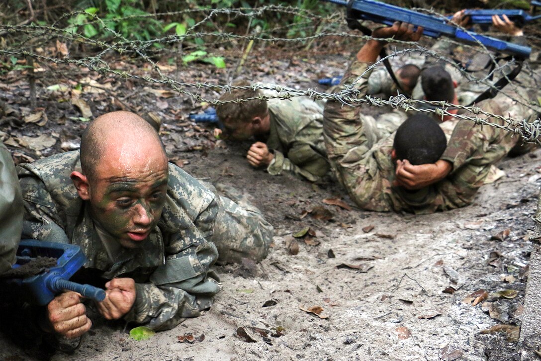 Soldiers traverse rocky terrain at the French jungle warfare school in Gabon, June 9, 2016. The soldiers are assigned to the 3rd Infantry Division’s Company B, 3rd Battalion, 7th Infantry Regiment, 2nd Infantry Brigade Combat Team. Army photo by Staff Sgt. Candace Mundt