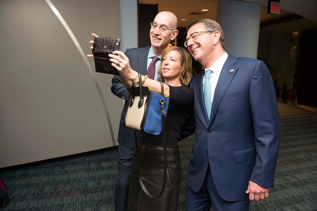 Defense Secretary Ash Carter, his wife Stephanie and NBA Commissioner Adam Silver take a selfie together at Game 4 of the 2016 NBA Finals  in Cleveland, June 10, 2016. DoD photo by Navy Petty Officer 1st Class Tim D. Godbee