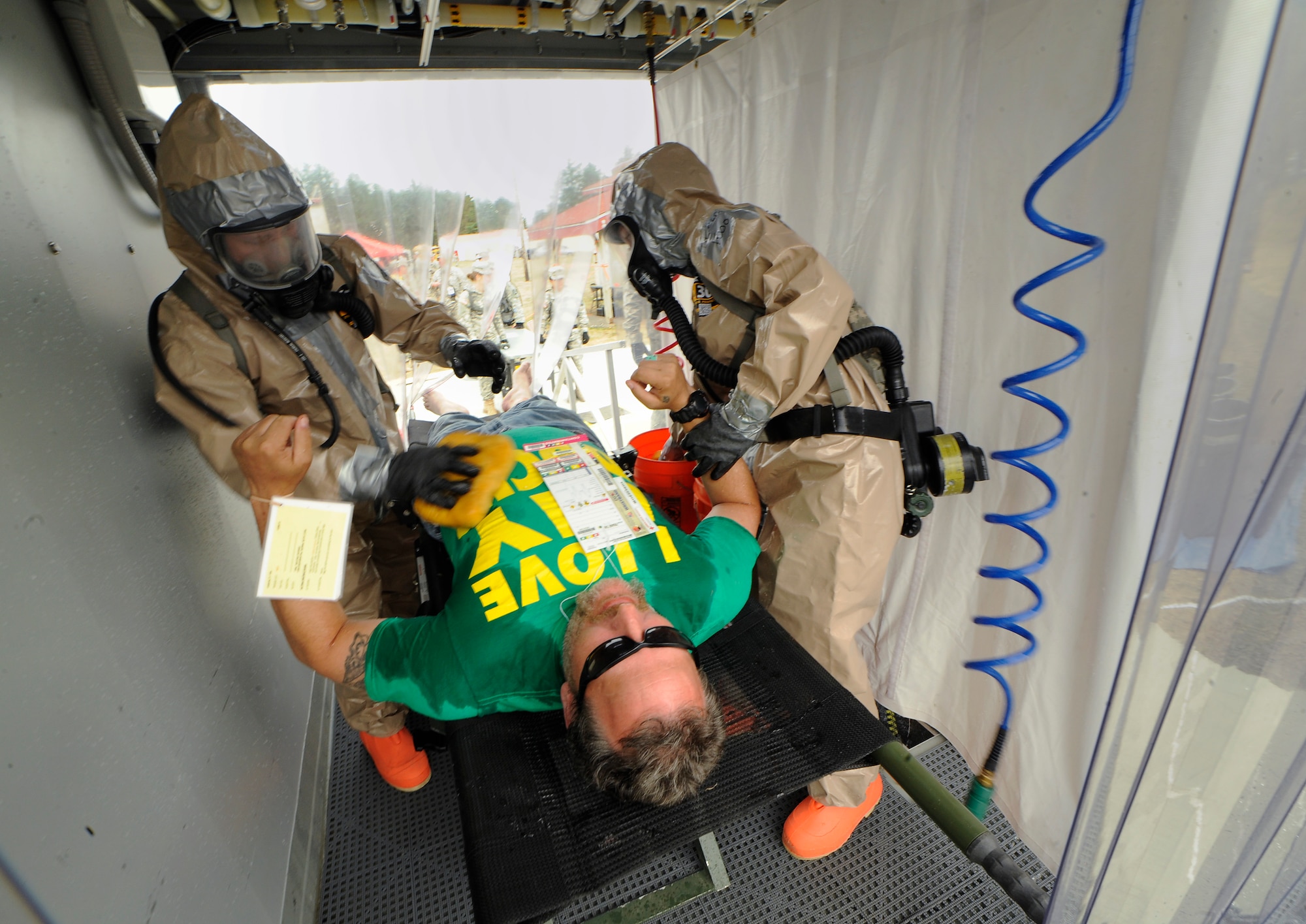 The CBRNE Enhanced Force Response Force Package (CERFP) members from the Oregon and Kentucky National Guard treat injured victims during the Cascadia Rising exercise at Camp Rilea, Warrenton, Ore., June 9, 2016. Cascadia Rising scenario is a 9.0 magnitude earthquake along the Cascadia Subduction Zone (CSZ) resulting in a tsunami, testing first responders, emergency management and public safety officials in the Pacific Northwest. (U.S. Air National Guard photo by Tech. Sgt. John Hughel, 142nd Fighter Wing Public Affairs/Released) 
