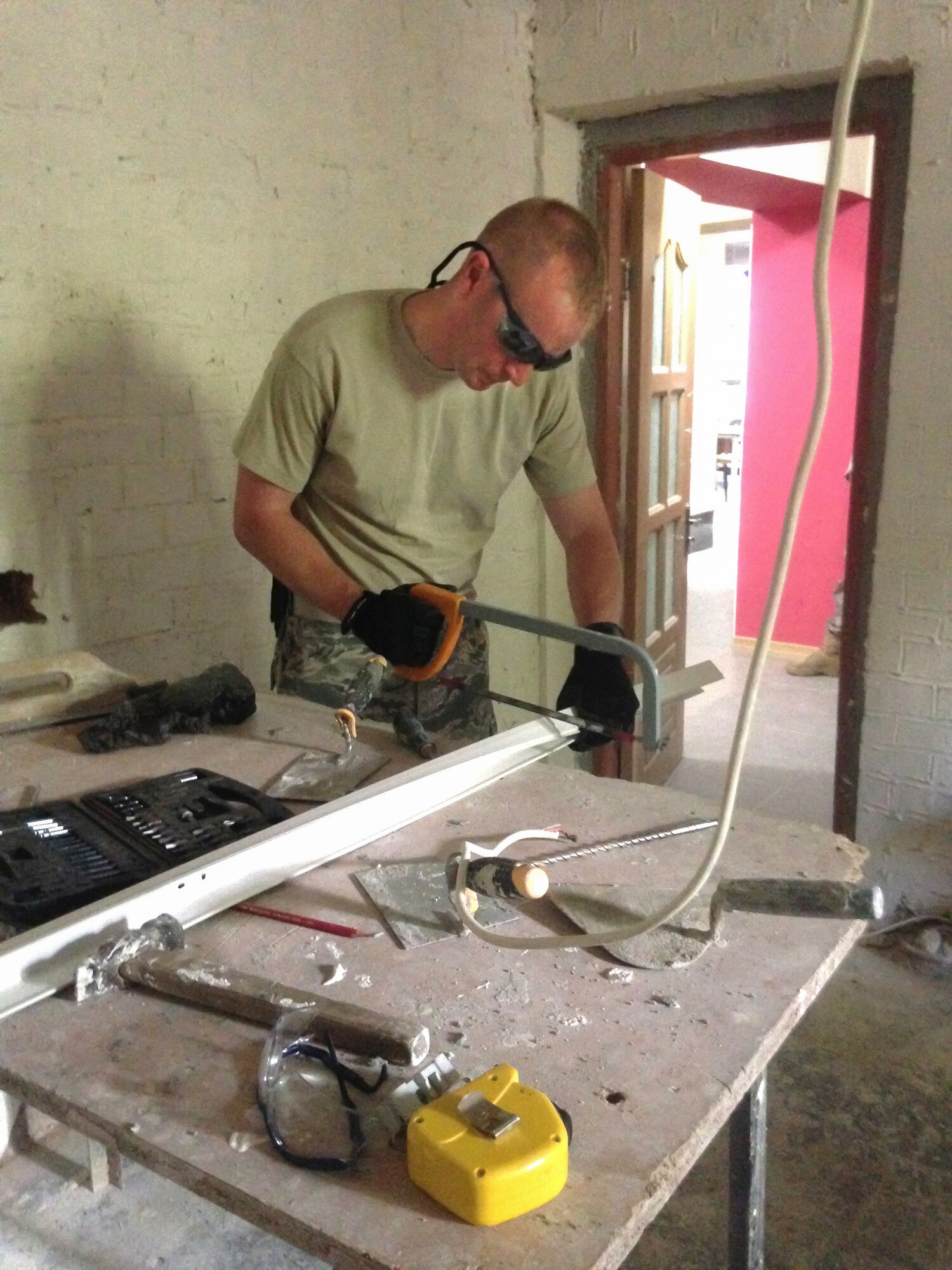 U.S. Air Force Master Sgt. Kyle Petty from the Kentucky Air National Guard’s 123rd Civil Engineer Squadron in Louisville, Kentucky, assists with minor repairs to La Via Moldova, a local after-school program for at-risk students in Chisinau, Moldova, during his free time June 7, 2016. Petty’s squadron is in the country to renovate the kitchen at Special School #12, the only school in Moldova specifically for deaf and special-needs students. The project is a partnership with the Office of Defense Cooperation and U.S. European Command, with funds being provided by the National Guard Bureau. (U.S. Air National Guard photo by Tech. Sgt. Vicky Spesard)