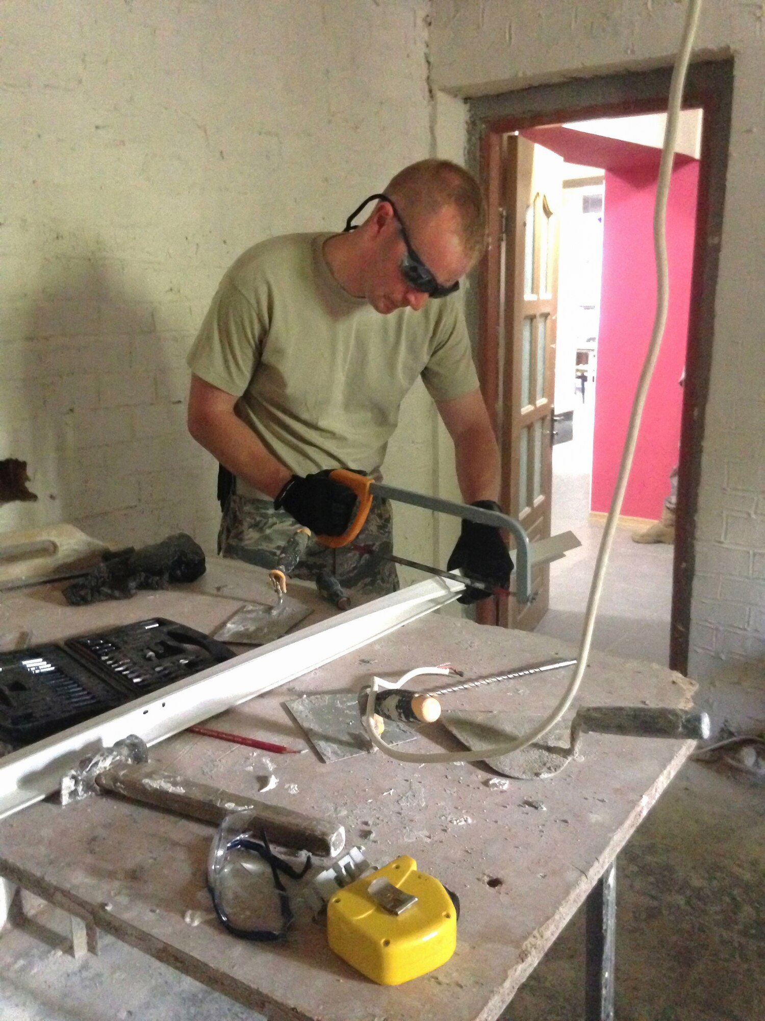 U.S. Air Force Master Sgt. Kyle Petty from the Kentucky Air National Guard’s 123rd Civil Engineer Squadron in Louisville, Kentucky, assists with minor repairs to La Via Moldova, a local after-school program for at-risk students in Chisinau, Moldova, during his free time June 7, 2016. Petty’s squadron is in the country to renovate the kitchen at Special School #12, the only school in Moldova specifically for deaf and special-needs students. The project is a partnership with the Office of Defense Cooperation and U.S. European Command, with funds being provided by the National Guard Bureau. (U.S. Air National Guard photo by Tech. Sgt. Vicky Spesard)