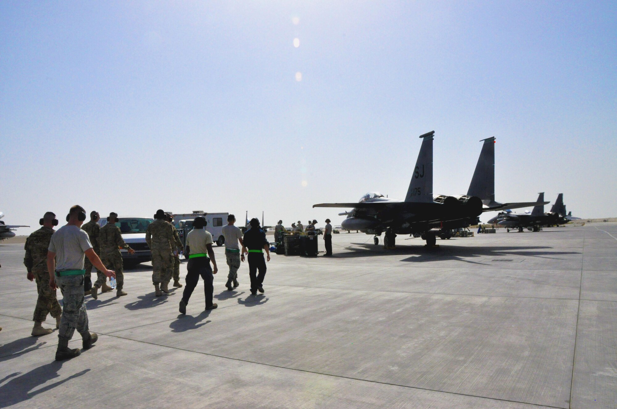 Airmen from the 380th Expeditionary Aircraft Maintenance Squadron introduced a group of Army 3rd Battalion 2nd Air Defense Artillery Regiment Soldiers May 17 to an F-15 Strike Eagle to exchange information on air defense capabilities. The 380th Air Expeditionary Wing relies on Soldiers to ready and maintain Patriot missiles, so the visit augmented understanding of how the Army and Air Force work in tandem to maintain air superiority. (U.S. Air Force photo by Staff Sgt. Samantha Mathison)