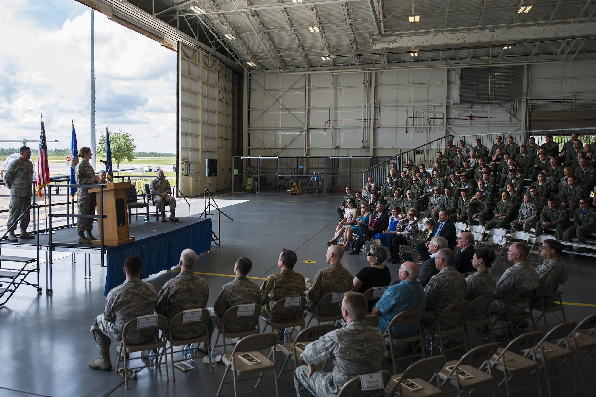 Col. Regina Sabric addresses her new group at the 919th Special Operations Group’s change of command ceremony June 12 at Duke Field, Fla.  Sabric was stationed at the Pentagon before becoming the first female commander of the group.  U.S. Air Force photo/Tech. Sgt. Sam King)