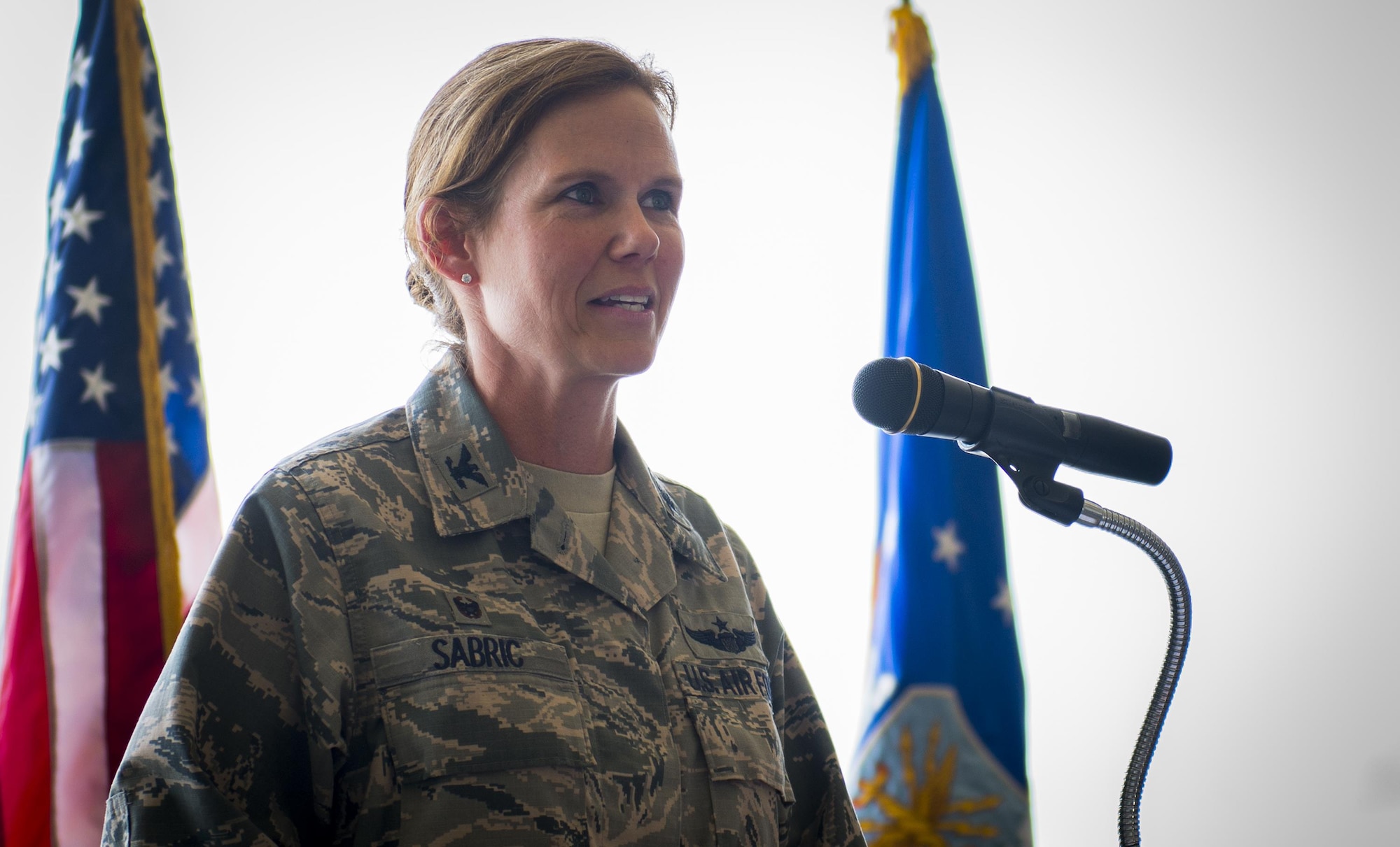 Col. Regina Sabric addresses her new group at the 919th Special Operations Group’s change of command ceremony June 12 at Duke Field, Fla.  Sabric was stationed at the Pentagon before becoming the first female commander of the group.  U.S. Air Force photo/Tech. Sgt. Sam King)