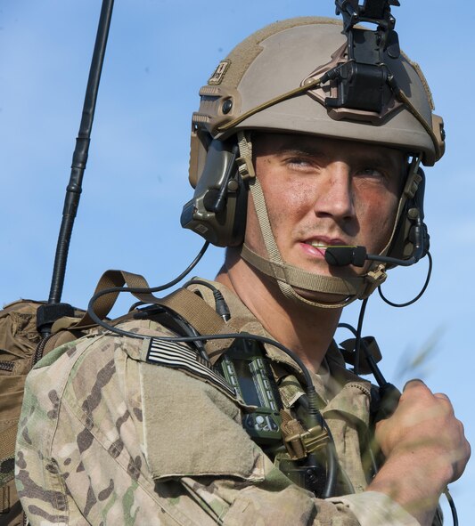 U.S. Air Force Airman 1st Class Daniel Muso, 4th Air Space Operations Squadron joint terminal attack controller, communicates with ground forces during Exercise Anakonda 2016 June 9, 2016, at Swidwin Air Base, Poland. Combined training and security cooperation programs allow allies to respond more efficiently to crises and meet their own security needs. (U.S. Air Force photo/Airman 1st Class Lane T. Plummer)