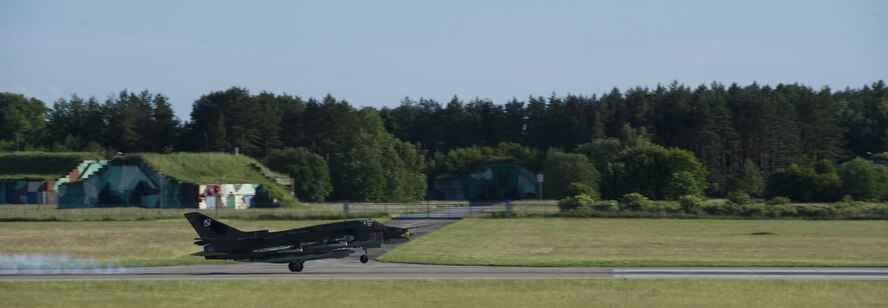 A Sukhoi SU-22 lands during Exercise Anakonda 2016 June 9, 2016, at Swidwin Air Base, Poland. Anakonda 2016 is a Polish-led exercise that seeks to train, exercise and integrate Polish national command force structures into an environment involving other countries. The exercise’s objective is to conduct complex training events, such as multinational air assault and airborne operations, air defense operations and bridging operations, to improve cooperative abilities and demonstrate U.S. commitment to regional security. (U.S. Air Force photo/Airman 1st Class Lane T. Plummer)