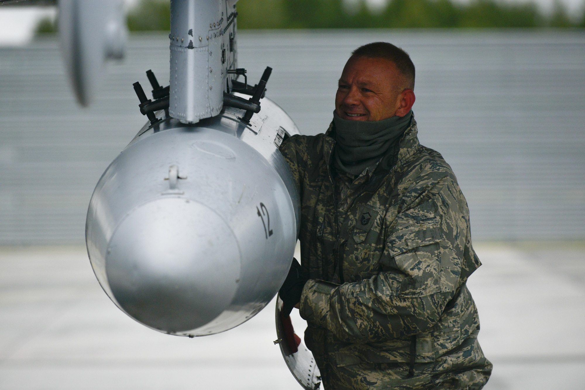 U.S. Air Force Master Sgt. Chris Asselin, 127th Aircraft Maintenance Squadron flight chief, unloads equipment from an A-10C Thunderbolt II at Lielvarde Air Base, Latvia June 11, 2016.  U.S. armed forces and Latvian airmen will participate in Saber Strike 16; a long-standing, U.S. Joint Chiefs of Staff-directed, U.S. Army Europe-led cooperative-training exercise taking place throughout Estonia, Latvia and Lithuania. (U.S. Air Force photo/Senior Airman Nicole Keim)
