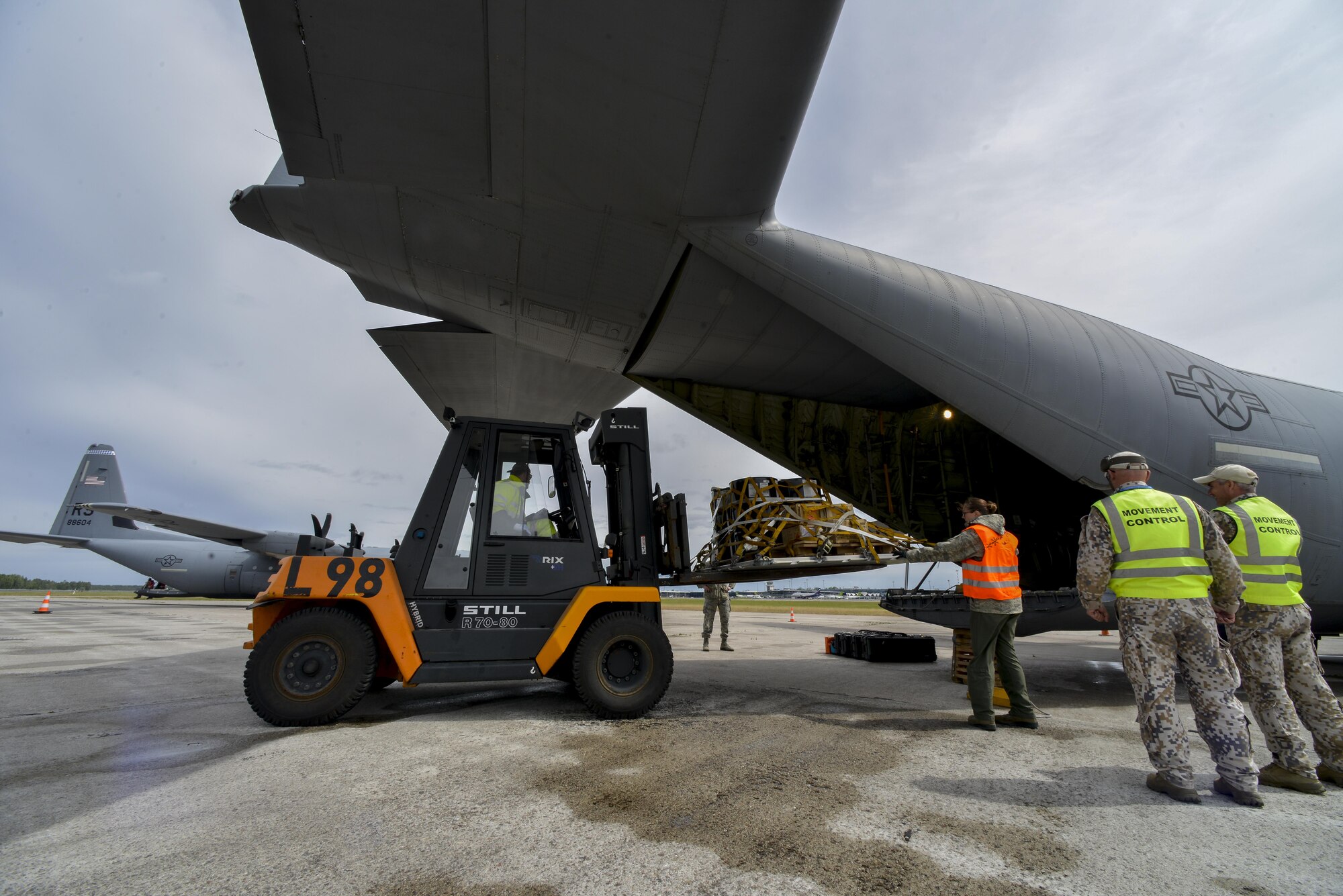 U.S. Airmen from the 37th Airlift Squadron, Ramstein, Germany, and Latvian airmen load cargo onto a C-130J Super Hercules June 10, 2016, at Riga Airport, Latvia.  U.S. forces are in Europe participating in Saber Strike 16; a long-standing, U.S. Joint Chiefs of Staff-directed, U.S. Army Europe-led cooperative-training exercise, which has been conducted annually since 2010. (U.S. Air Force photo/Senior Airman Nicole Keim)