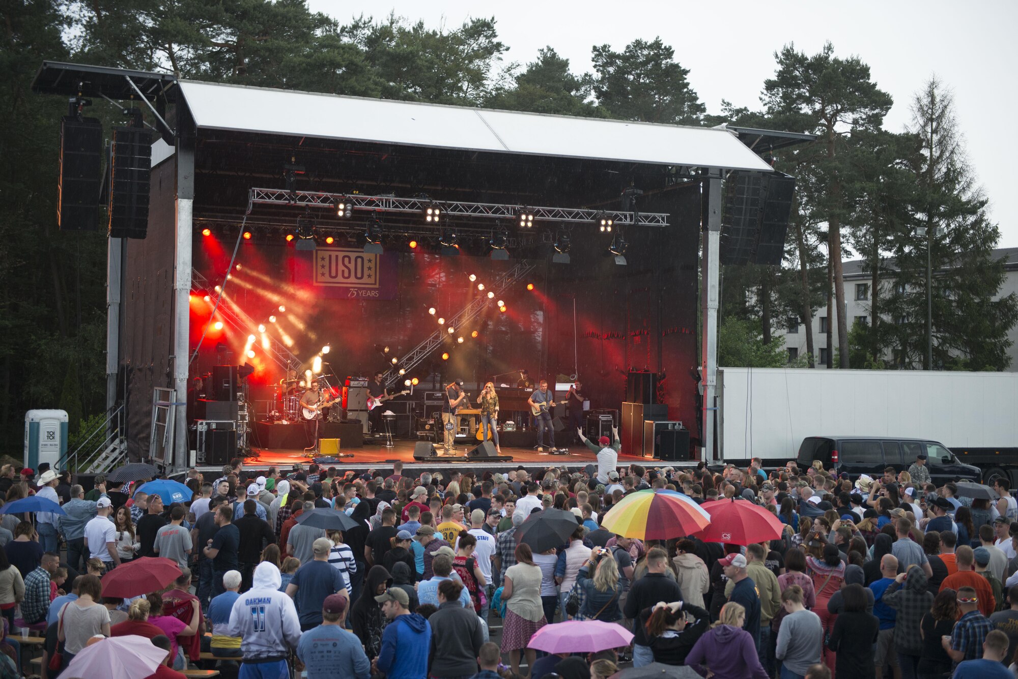 Spectators watch a concert performed by Trace Adkins and his band at Ramstein Air Base, Germany, June 11, 2016. The free event was provided by the USO. (U.S. Air Force photo/ Airman 1st Class Joshua Magbanua)