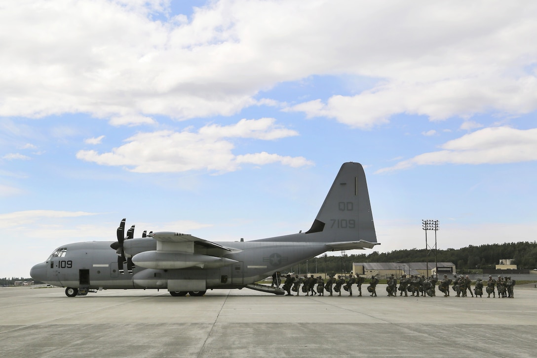 Paratroopers board a KC-130J Super Hercules aircraft before participating in an airborne operation during Arctic Aurora 2016 at Joint Base Elmendorf-Richardson, Alaska, June 2, 2016. Air Force photo by Alejandro Pena