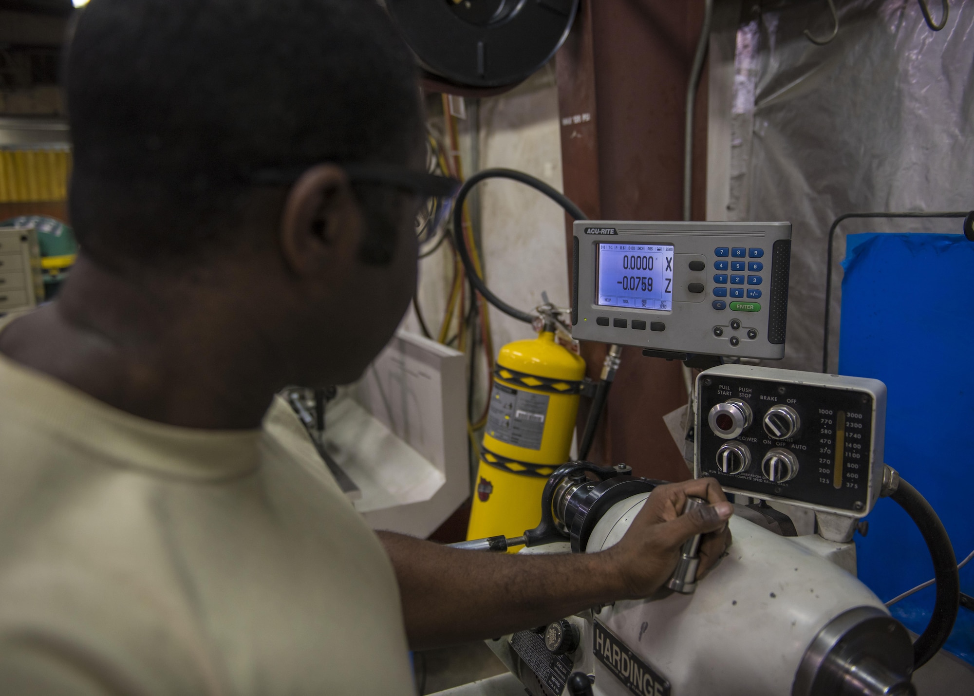 Staff Sgt. Brandon Wilson, 455th Expeditionary Maintenance Squadron aircraft metals technician, uses digital adjustments for accuracy to help fabricate aircraft parts, June 09, 2016, Bagram Airfield, Afghanistan. The 455th EMXS is the only FAA approved organization in theater authorized by Airworthiness Directorates to mount and use equipment in DoD owned and operated aircraft. (U.S. Air Force photo by Senior Airman Justyn M. Freeman)