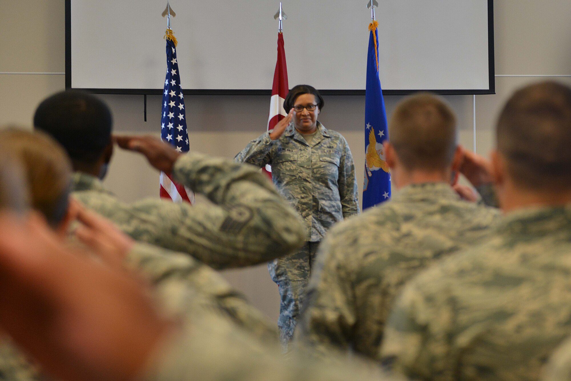 U.S. Air Force Maj. Yalunda Akinloba, 39th Contracting Squadron incoming commander, renders her first salute to the 39th CONS Airmen June 13, 2016, at Incirlik Air Base, Turkey. Prior to taking command, Akinloba was the lead contracting officer, developmental systems contracts, rapid capabilities office, Headquarters U.S. Air Force, Washington D.C. (U.S. Air Force photo by Senior Airman John Nieves Camacho/Released) 
