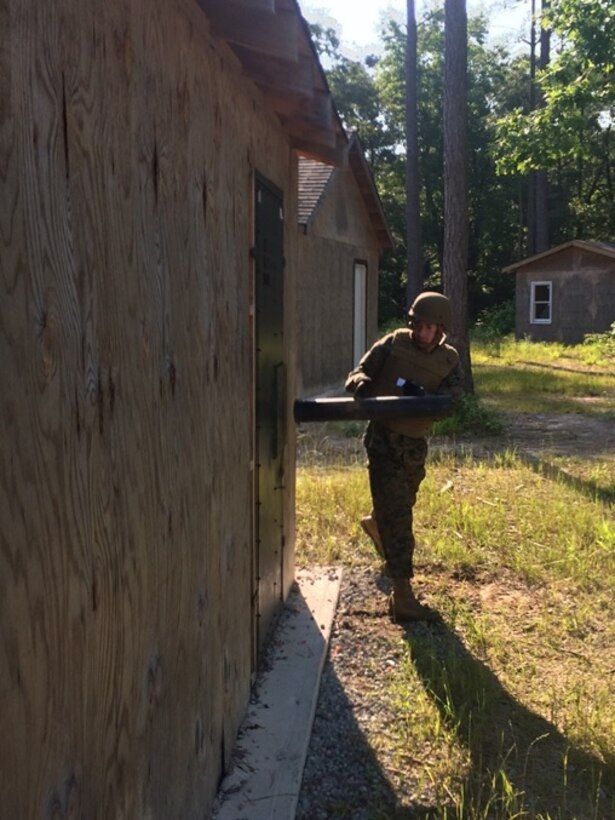 On June 3, 2016 First Lieutenant Jonathan Lanning Keller, a student attached to Combat Engineer Officer course 5-16 (CEO 5-16); breaches a building door with a battering ram.  Students with CEO 5-16 practice breaching with a wide variety of breaching methods, both mechanically and explosively.
