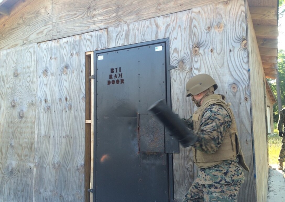 On May 26, 2016 Second Lieutenant Brock Yackey, a Marine attached to Combat Engineer Officer course 5-16 (CEO 5-16); uses the Thor’s Hammer to mechanically breach a door. Thor’s hammer is a hybrid battering ram and sledge hammer that provides an effective means of breaching a door.
