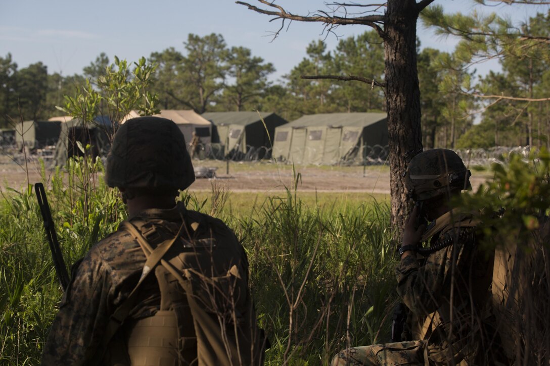 Marines with Kilo Company, 3rd Battalion, 6th Marine Regiment conduct reconnaissance before capturing the enemy operations center at Landing Zone Cardinal at Camp Lejeune, N.C., June 10, 2016. The battalion conducted a Marine Corps Combat Readiness Evaluation in preparation for the upcoming 24th Marine Expeditionary Unit slated in early 2017.