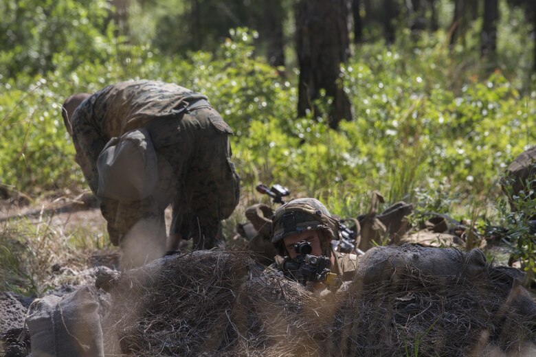 Private First Class Matthew Briggs, an assaultman with Lima Company, 3rd Battalion, 6th Marine Regiment, sets up security in a two-man team at Landing Zone Falcon at Camp Lejeune, N.C., June 9, 2016. The battalion conducted the final exercise, known as the Marine Corps Combat Readiness Evaluation, before they will chop over to the 24th Marine Expeditionary Unit slated for early 2017.