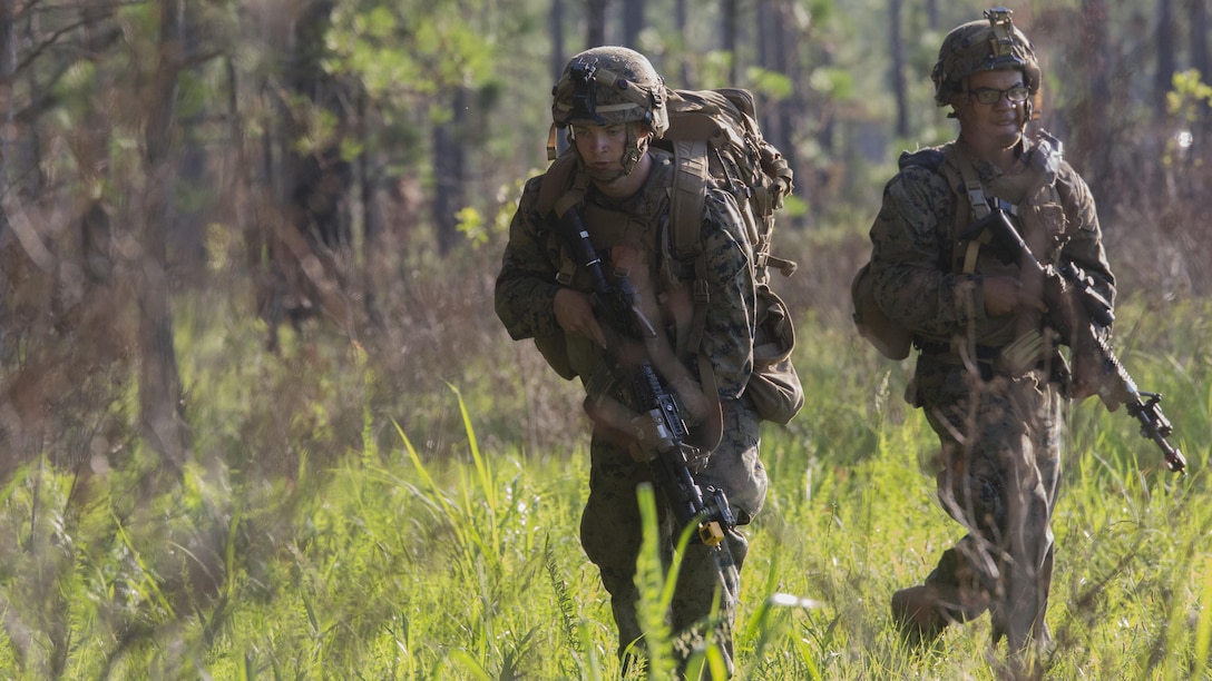 Marines with Kilo Company, 3rd Battalion, 6th Marine Regiment buddy rush the objective at Landing Zone Cardinal at Marine Corps Base Camp Lejeune, North Carolina, June 10, 2016. The battalion conducted a Marine Corps Combat Readiness Evaluation in preparation for the upcoming 24th Marine Expeditionary Unit slated in early 2017.