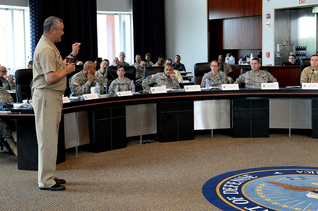 Navy Rear Adm. Ron MacLaren, director of the DLA Joint Reserve Force, speaks during the Combined Drill Weekend June 11 at the McNamara Headquarters Complex, Fort Belvoir. Virginia. JRF leadership from throughout DLA attended, which focused on readiness, training and operational support to DLA. 
